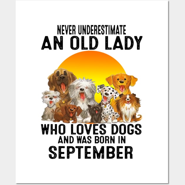 Never Underestimate An Old September Lady Who Loves Dogs Wall Art by trainerunderline